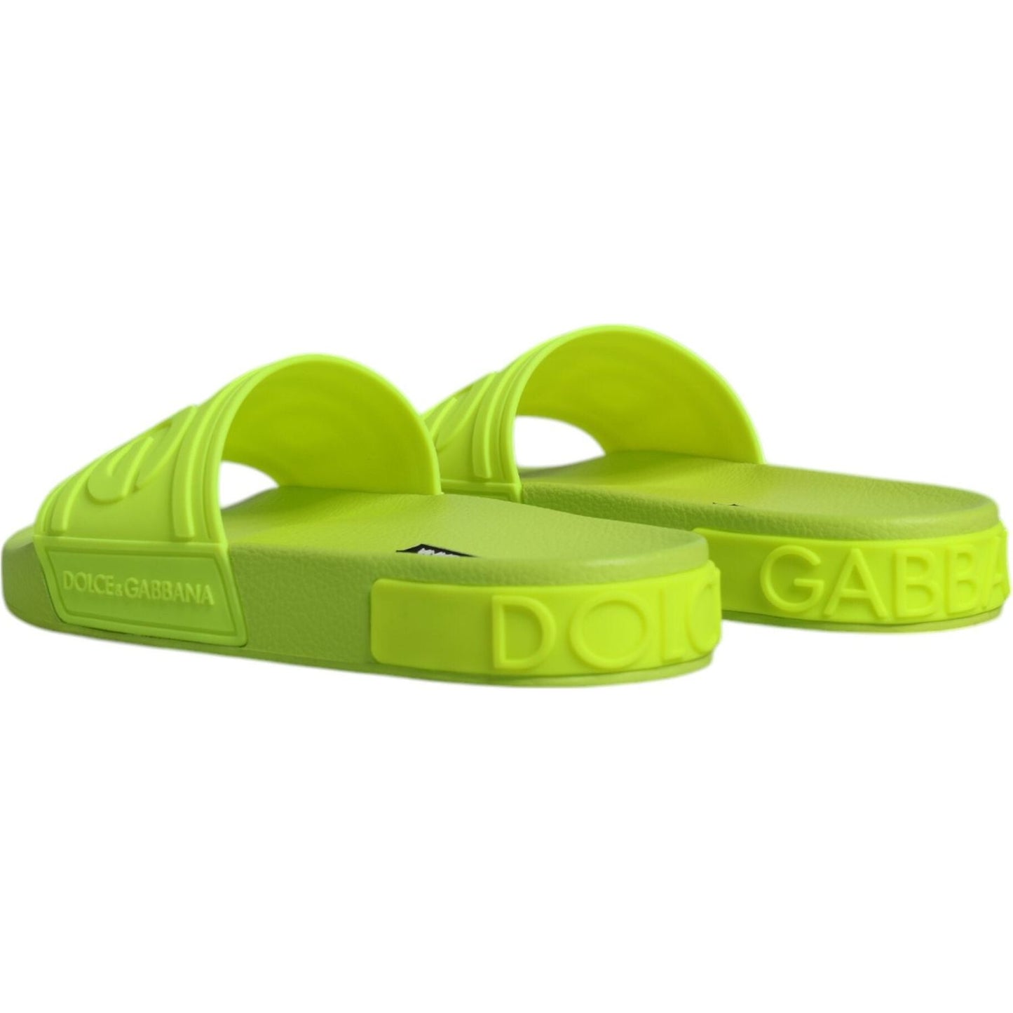 Dolce & Gabbana neon green rubber slides sandals with logo details, made in Italy, perfect for beachwear.