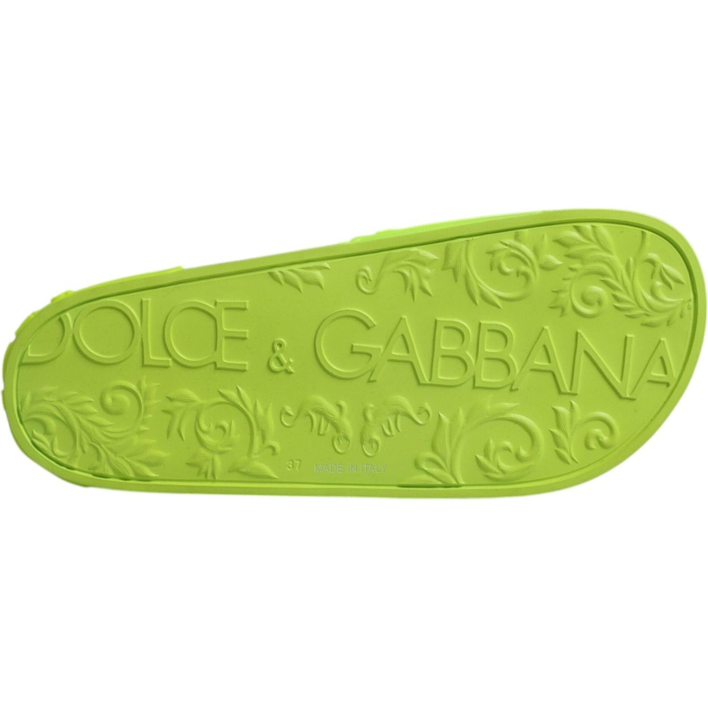 Dolce & Gabbana neon green rubber slide sandal with embossed logo on sole.