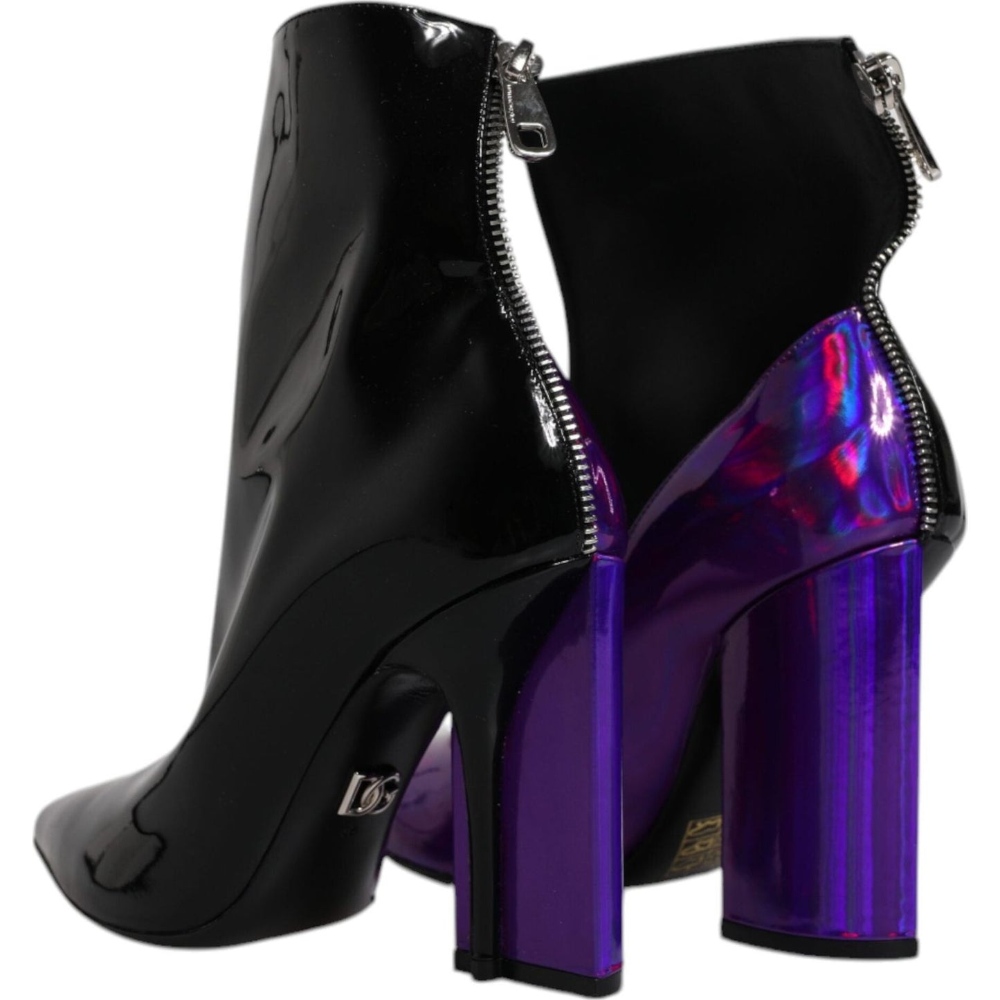 Dolce & Gabbana purple and black pointed ankle boots with zipper closure, leather sole, and logo details. Made in Italy.
