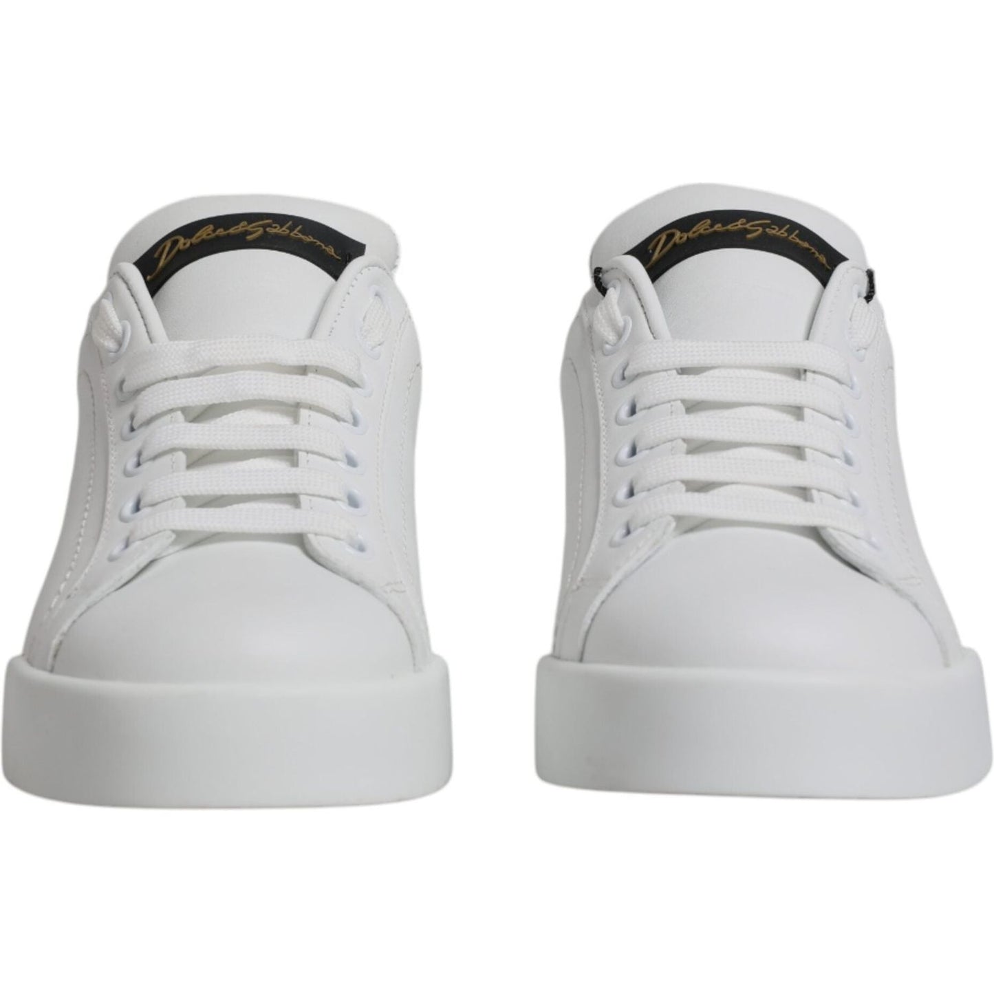 Dolce & Gabbana white leather low top sneakers with rubber soles, lace-up closure, and logo details, crafted in Italy.