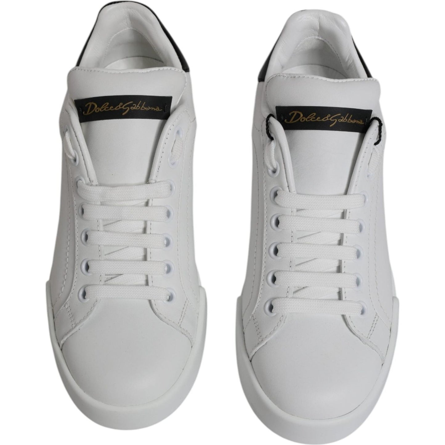 Dolce & Gabbana white leather low top sneakers with lace-up closure and logo detail, high-quality calf leather, rubber sole, Italian made.