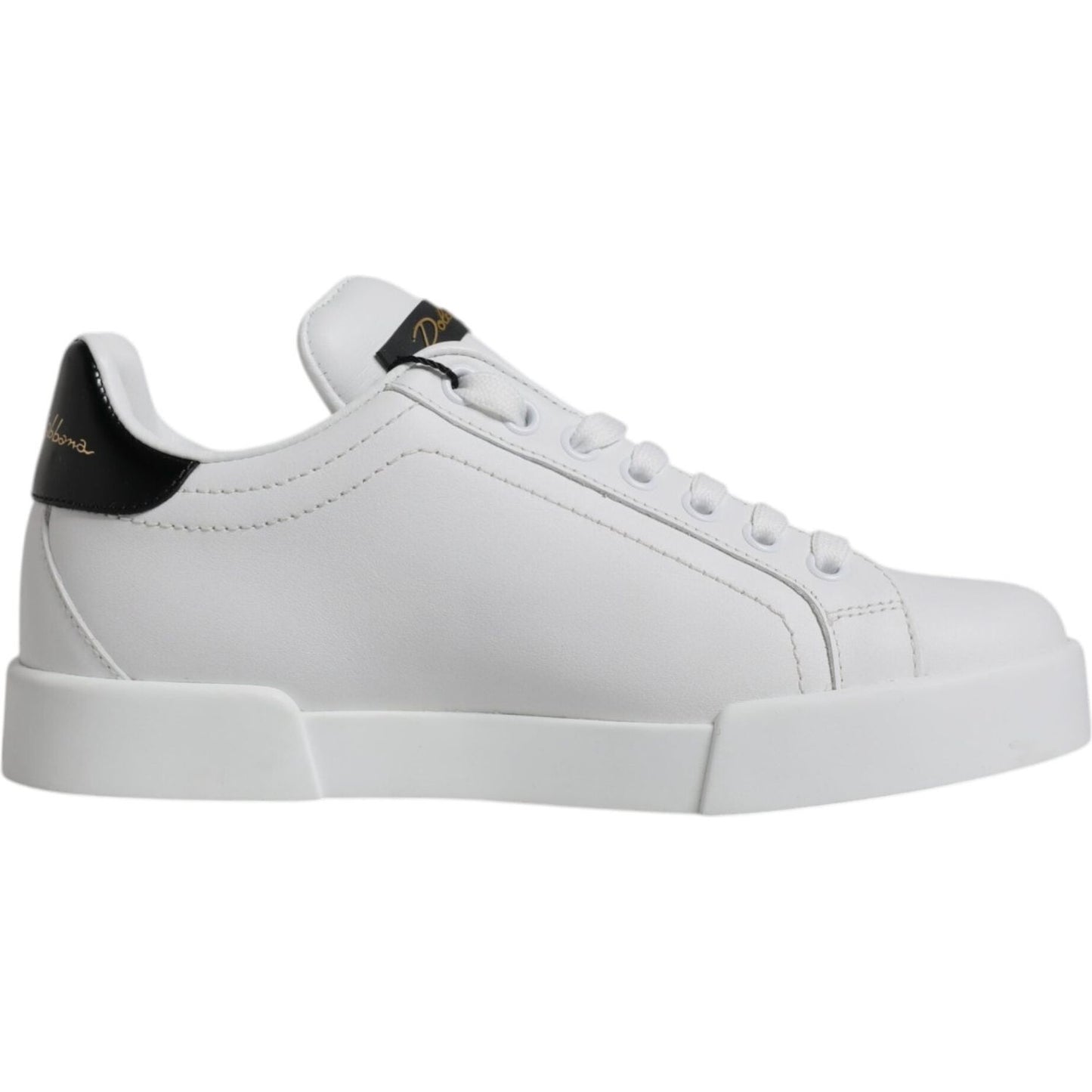 Dolce & Gabbana white leather low top sneakers with black accents, rubber sole, lace-up closure, 100% calf leather, made in Italy.