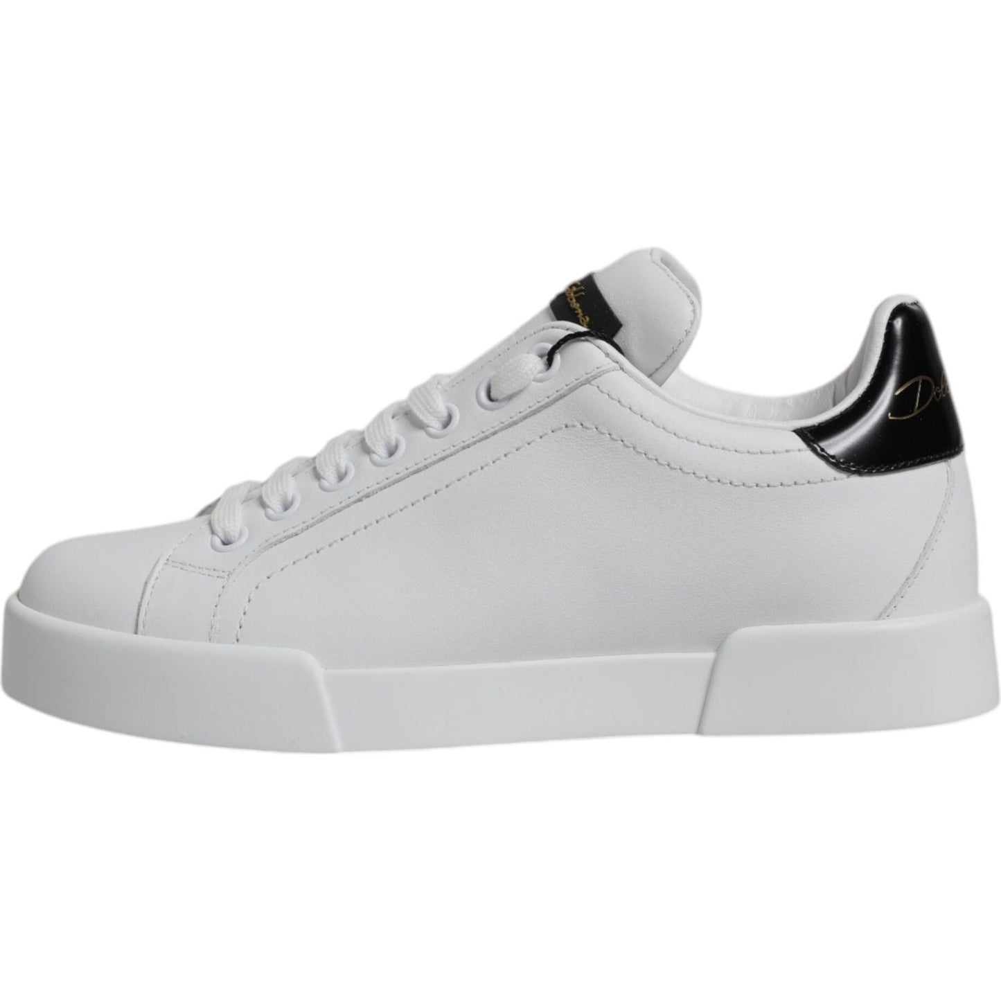 Dolce & Gabbana white leather classic low top sneakers with black accents, featuring a rubber sole and lace-up closure, made in Italy.