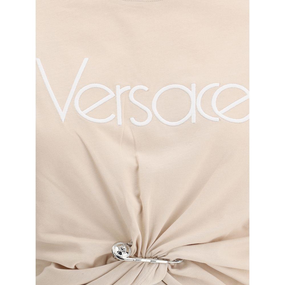 Versace cotton T-shirt with ribbed neck, monochrome pattern, Medusa logo pin and iconic monogram. Cropped style front drape detail.