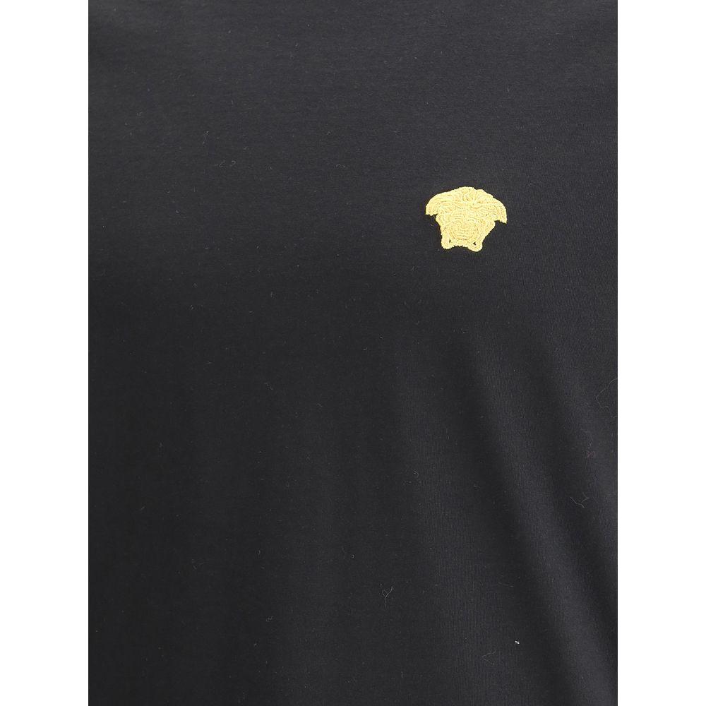 Versace cotton T-shirt featuring ribbed crew neck, iconic Medusa logo patch, monochrome pattern, regular fit design.