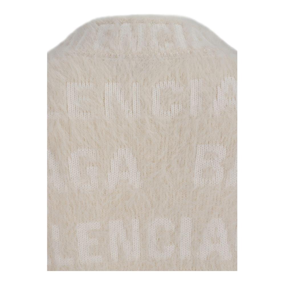 Close-up of Balenciaga wool sweater with high neck and jacquard weave monogram in an all-over pattern, showcasing ribbed texture.