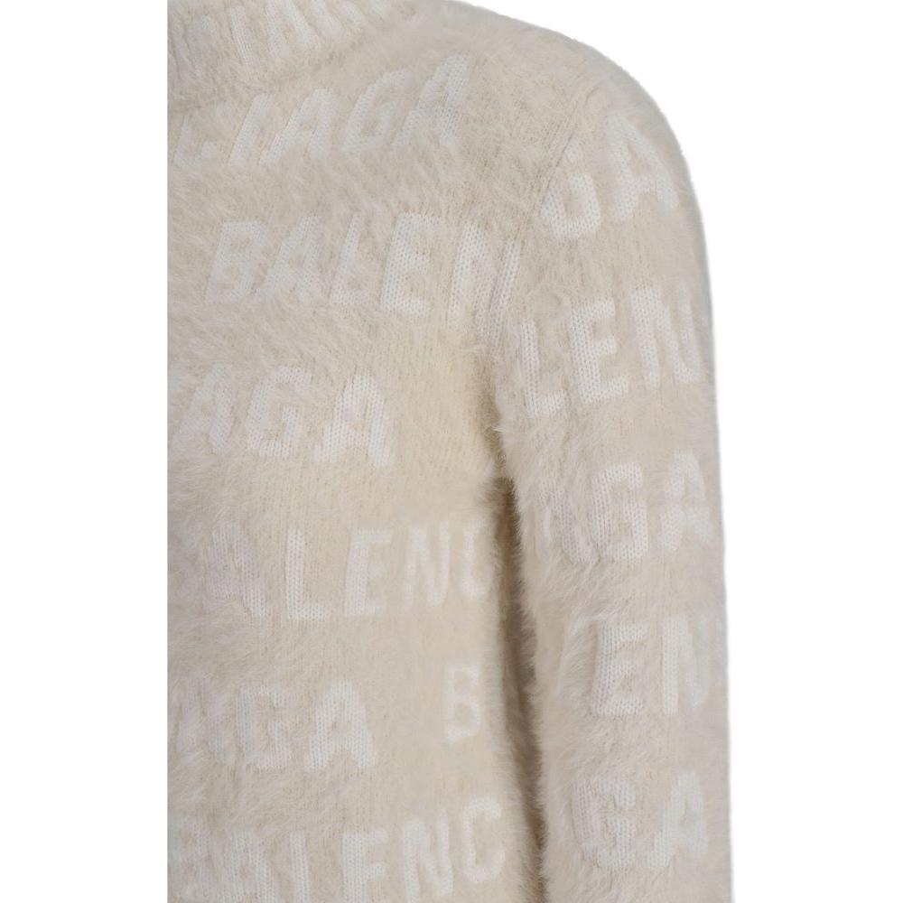 Balenciaga wool sweater with high neck, ribbed cuffs, and jacquard weave logo, featuring an all-over monogram design.
