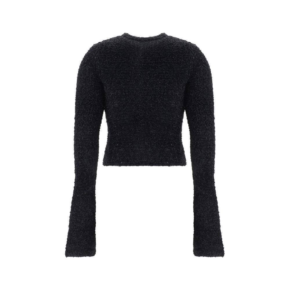 Back view of a black Balenciaga cropped cardigan with long sleeves and textured fabric.