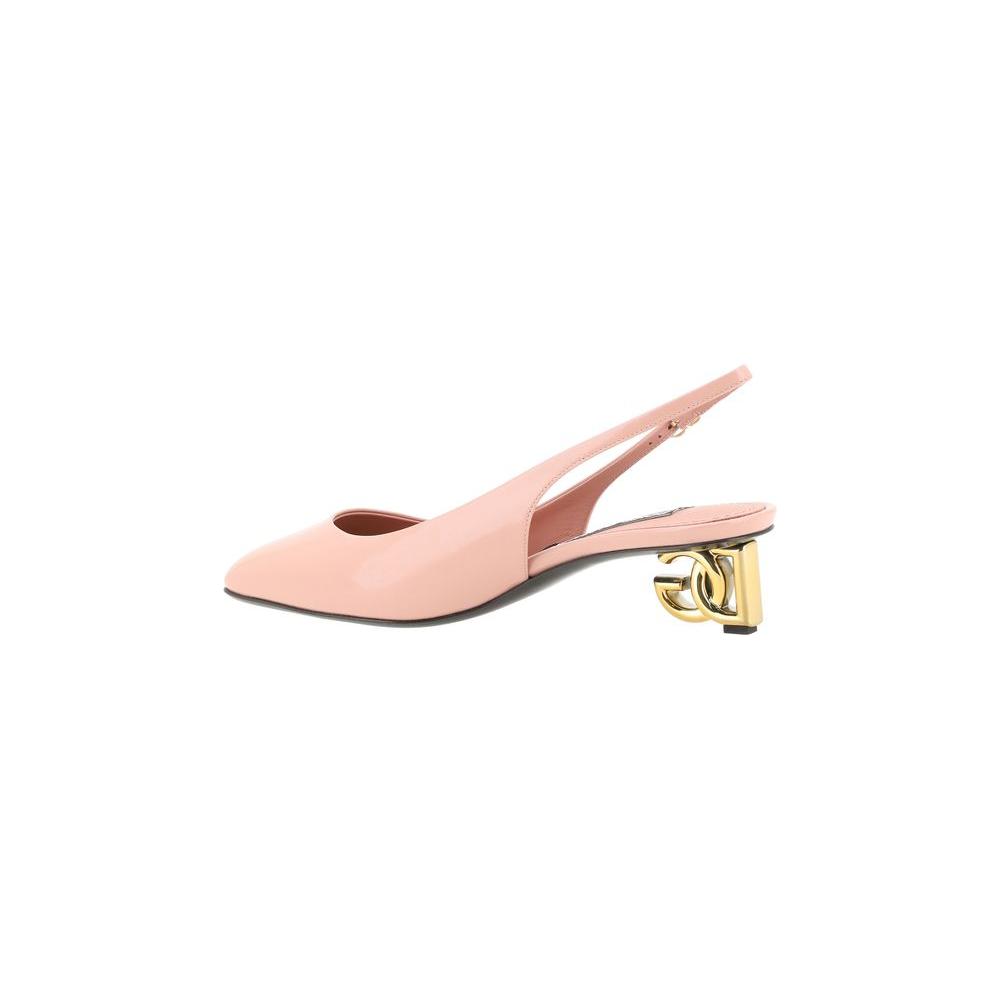 Dolce & Gabbana leather slingback pumps with square toe, gold D&G logo heel, blush pink patent leather shine, adjustable buckle fit.