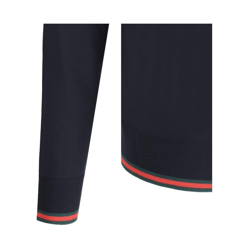 Gucci wool sweater with elegant ribbed cuffs and hem featuring iconic multicolored bands, showcasing timeless design and brand heritage.