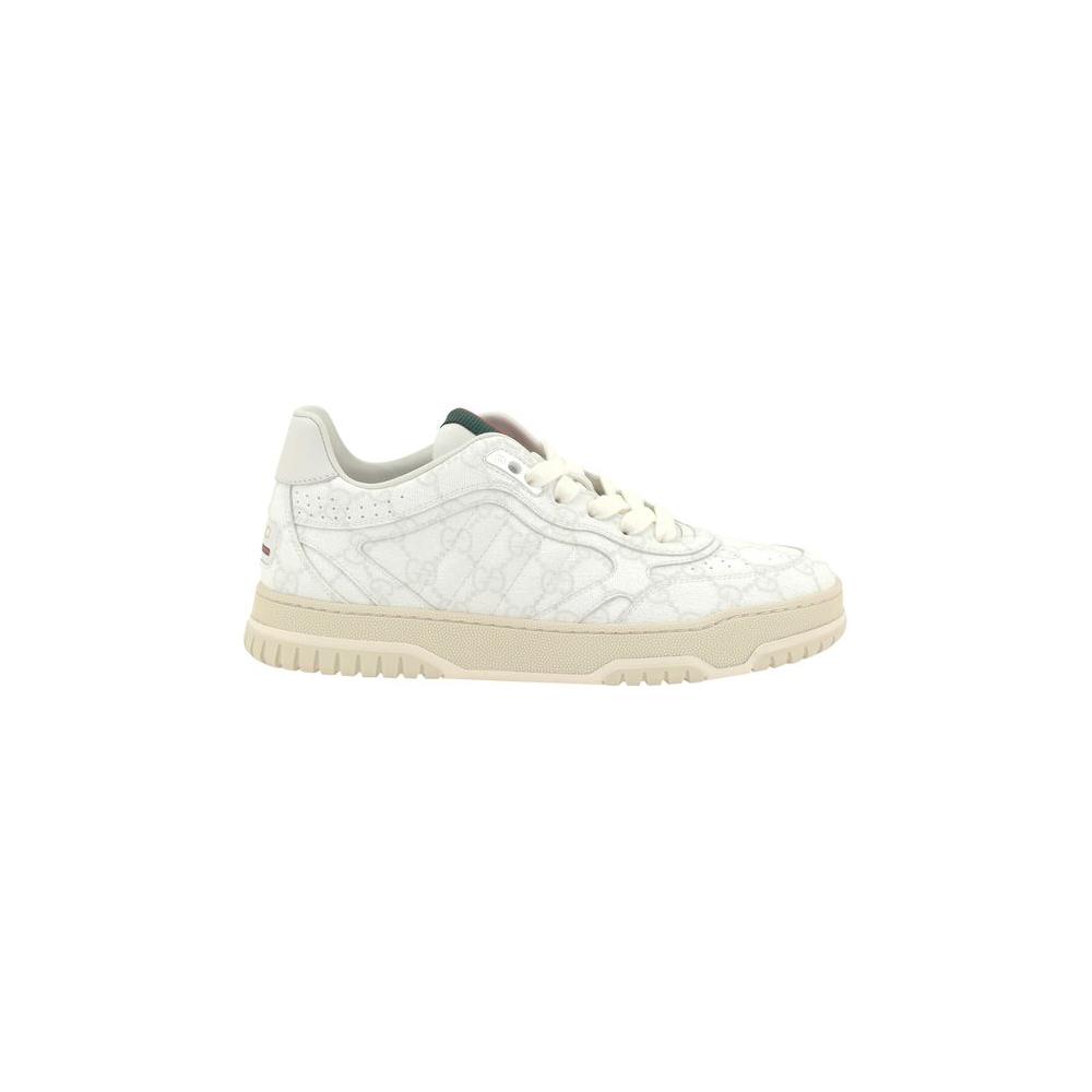 Gucci Logo Leather Sneakers with GG monogram and lace-up closure, featuring iconic applique and knurled sole for stylish elegance.