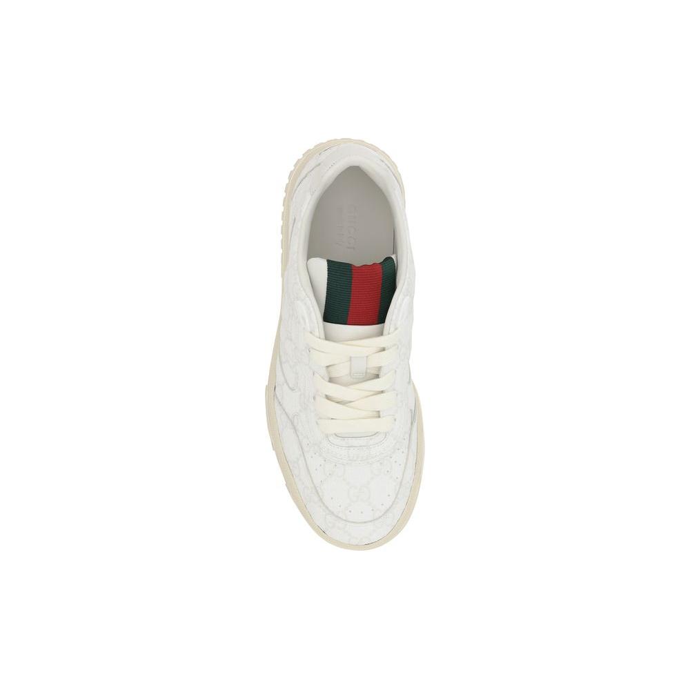 Top view of Gucci Logo Sneakers with GG monogram, lace-up closure, and signature red and green accents on the tongue.