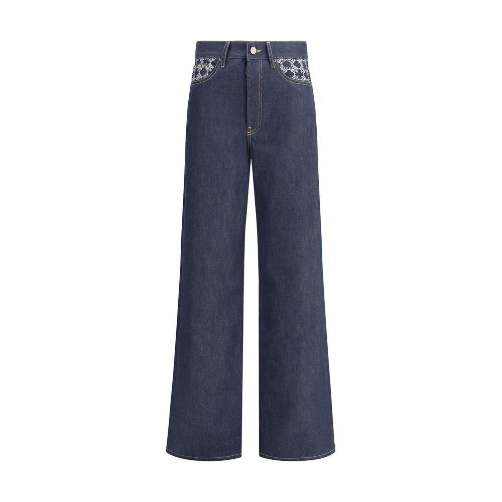 Amiri wide leg jeans with five-pocket style, front zipper, embossed logo, and palazzo cut for modern comfort and style.