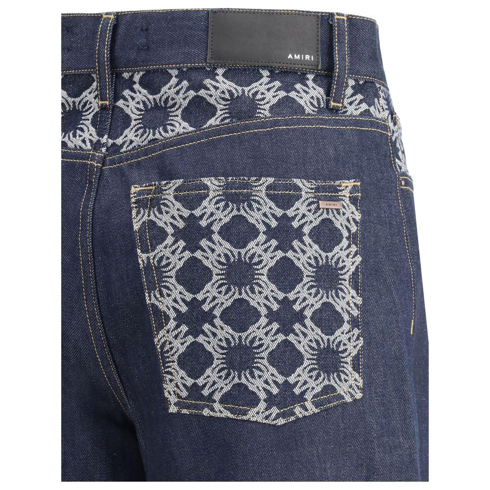 Back view of Amiri wide leg jeans featuring embossed logo detailing and five-pocket style, showcasing modern palazzo cut and unique design.