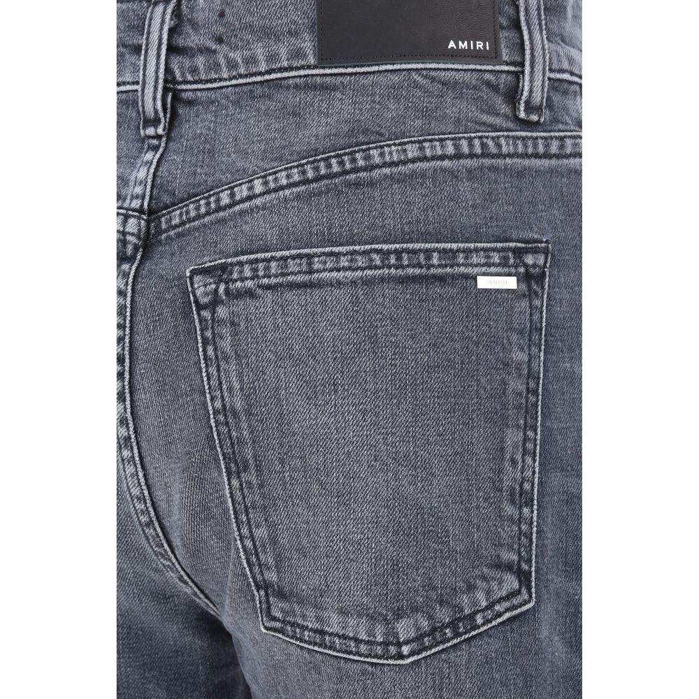 Back view of Amiri denim pants showing pocket and leather patch detailing.