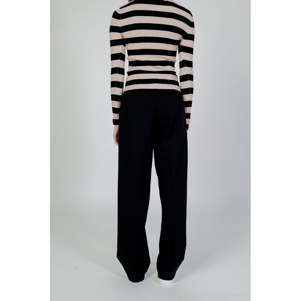 Woman wearing Street One black viscose palazzo pants, spring/summer collection. Features striped sweater. Ideal for casual wear.