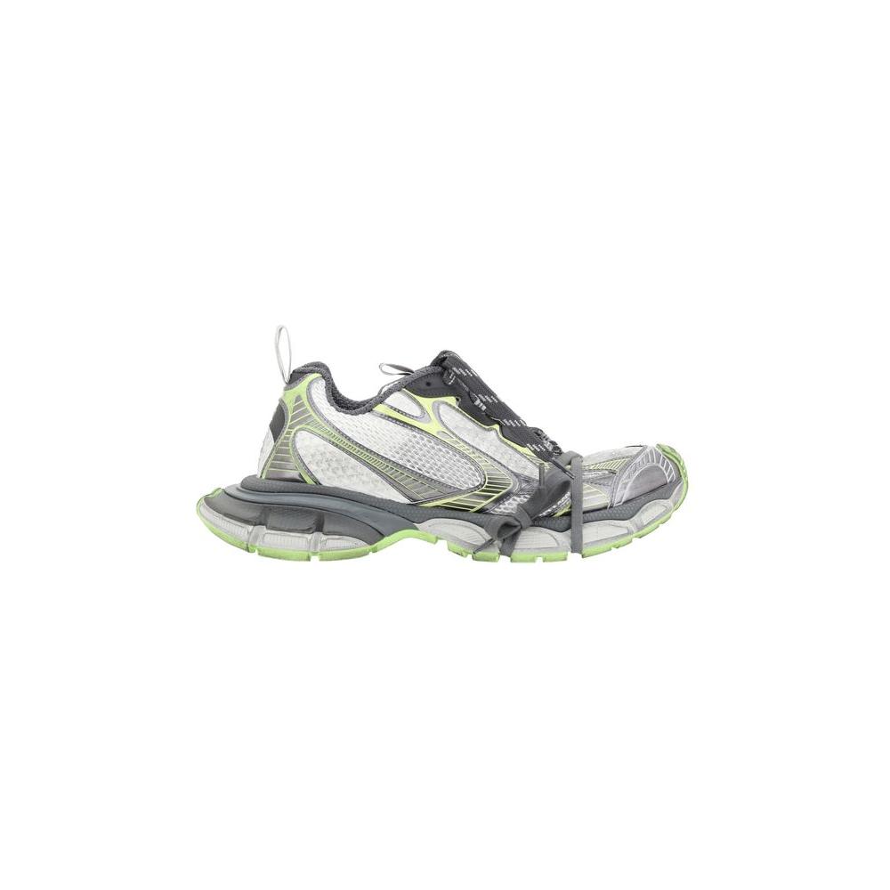 Side view of Balenciaga 3XL Sneakers featuring oversized design, chunky rubber sole, multiple laces, and mesh panels in gray and green.