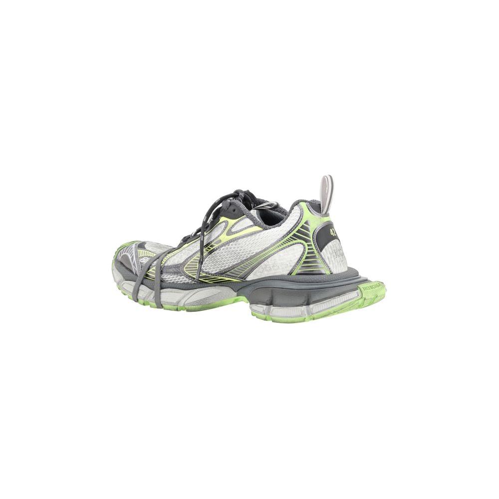 Side view of Balenciaga 3XL Sneakers with chunky rubber sole and double-tongue design, featuring mesh panels and multiple laces.
