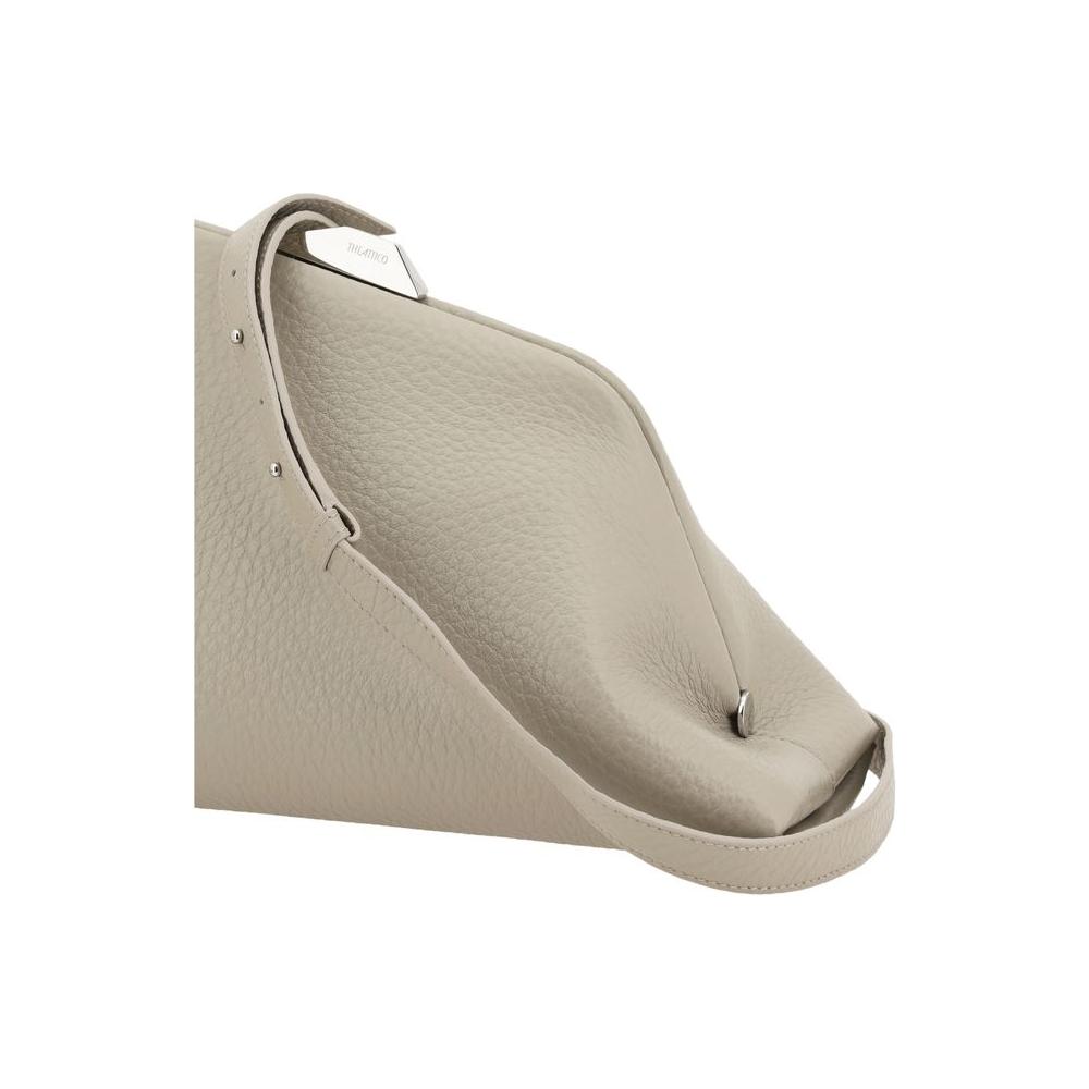 The Attico Day Off Shoulder Bag in leather with geometric shape, adjustable strap, magnetic closure, and interior pocket.