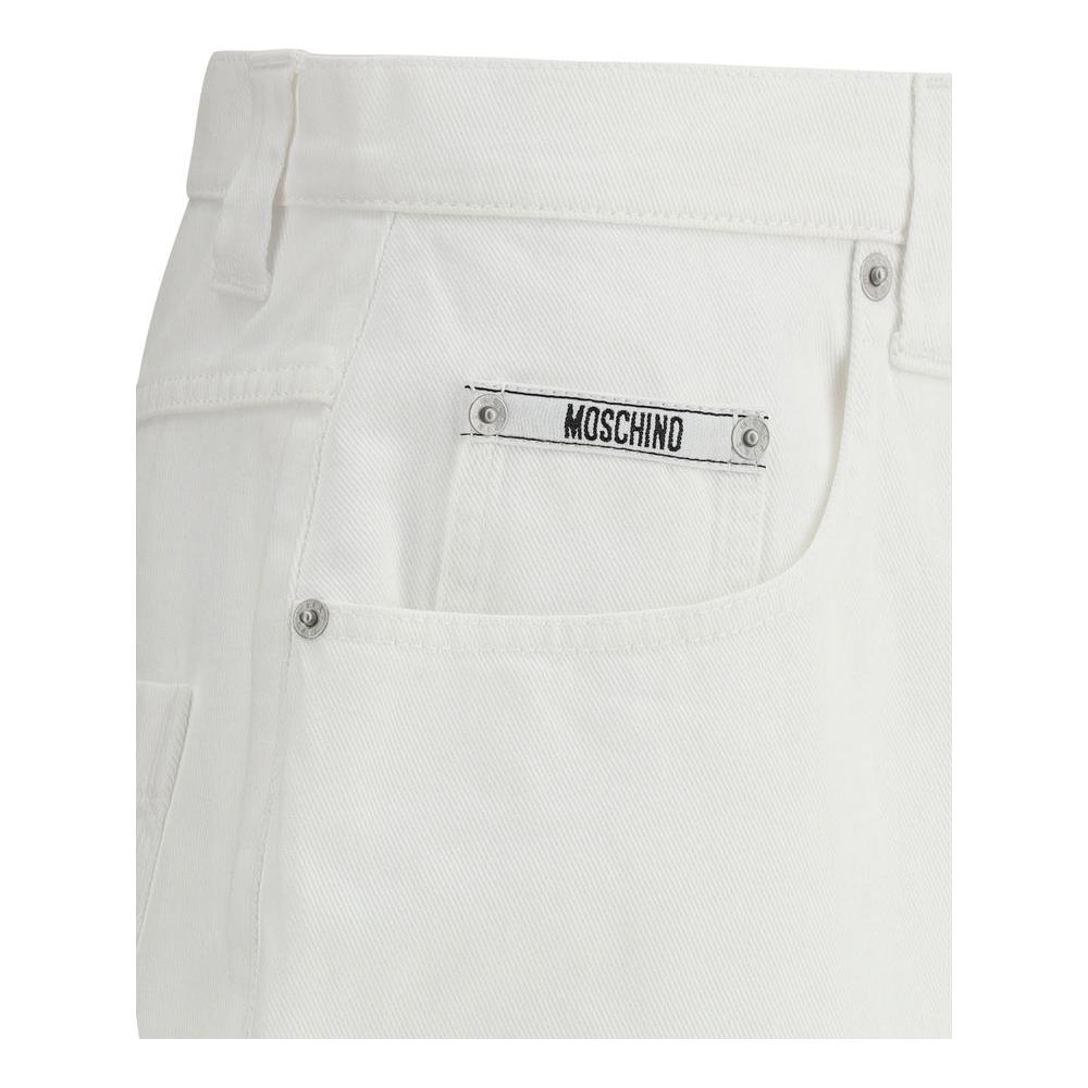 Close-up of Moschino denim baggy shorts pocket with brand logo, showcasing five-pocket design and belt loops for a casual style.