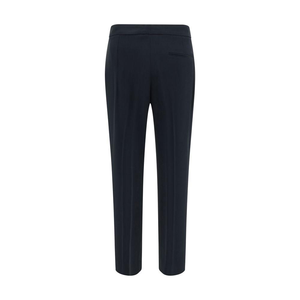 Back view of Alexander McQueen pants with hook-and-eye button, zipper closure, and pockets. Fashionable designer menswear.