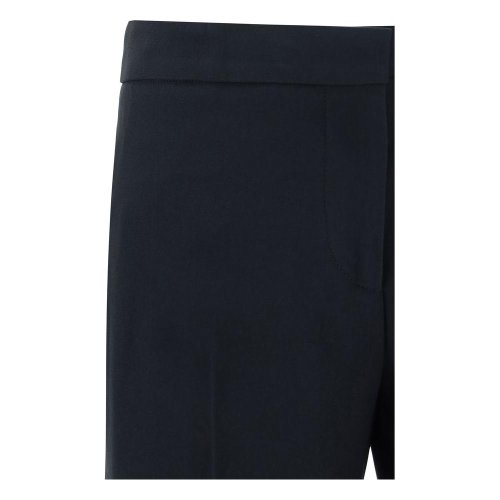 Side view of Alexander McQueen pants showcasing front closure and pocket style.