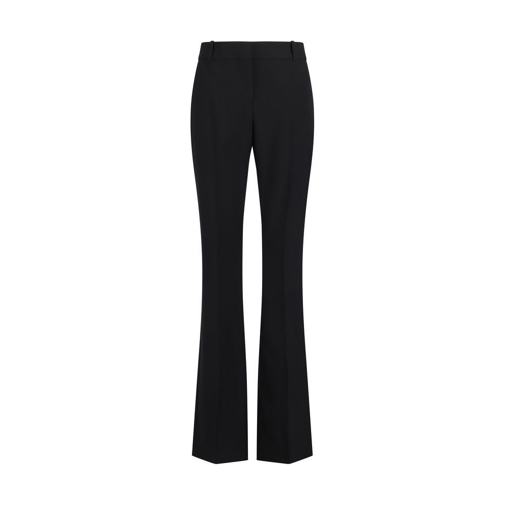 Alexander McQueen wool pants with leather patch, front zipper, monochrome, regular fit, side and back pockets.