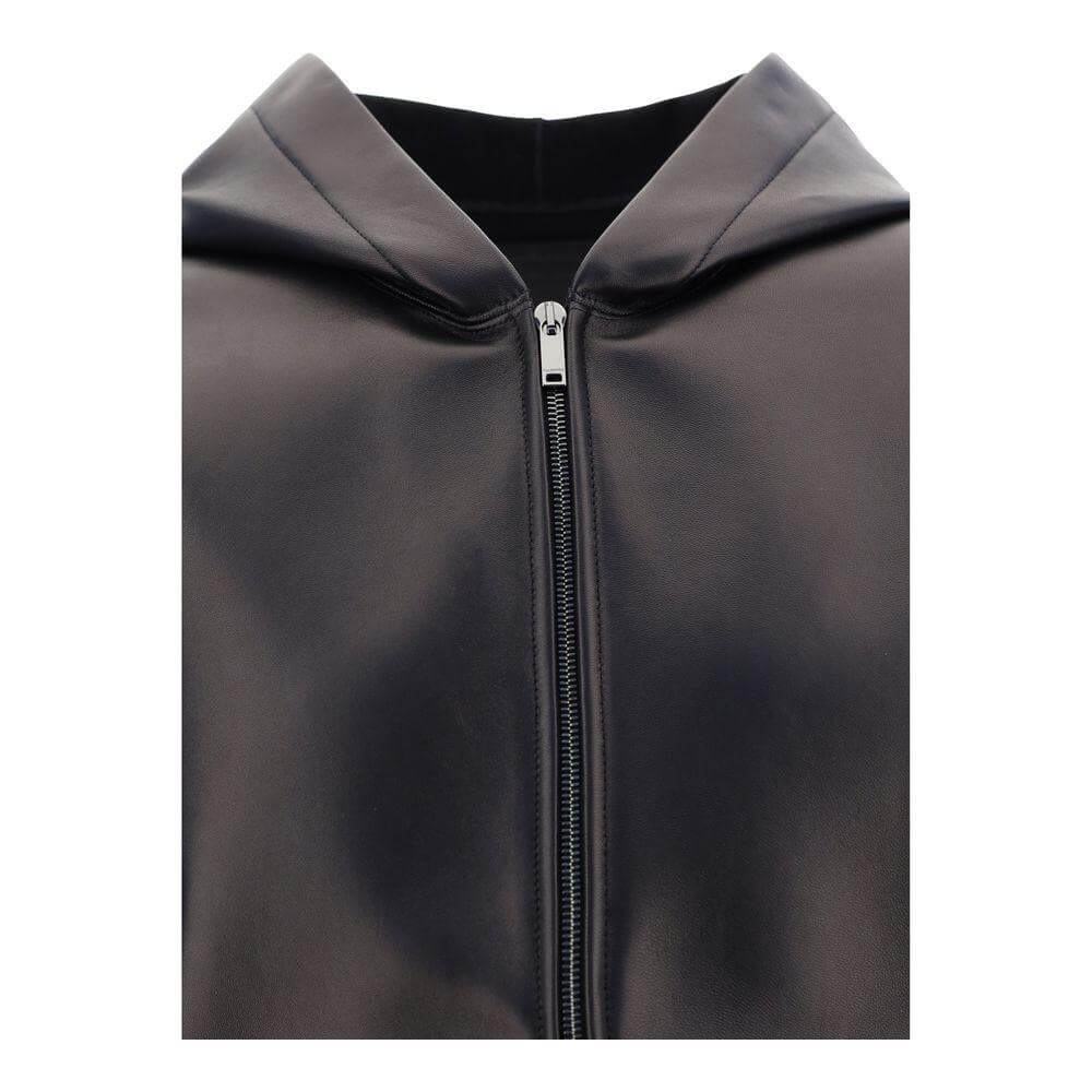 Close-up of Valentino lambskin leather jacket with hooded design and front zipper closure, featuring monochrome pattern and regular fit.