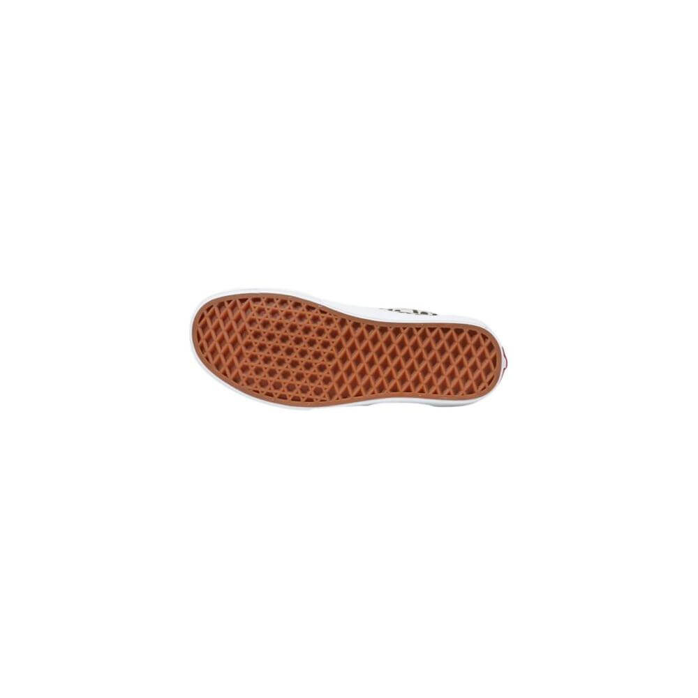 Sole view of Vans beige fabric sneaker, featuring durable rubber grip for long walks and casual wear.