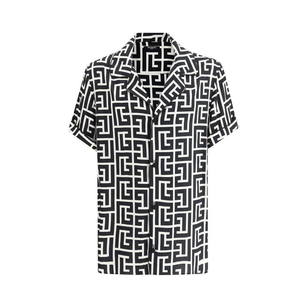 Balmain short-sleeved shirt with iconic logo pattern, lapels, and button closure.