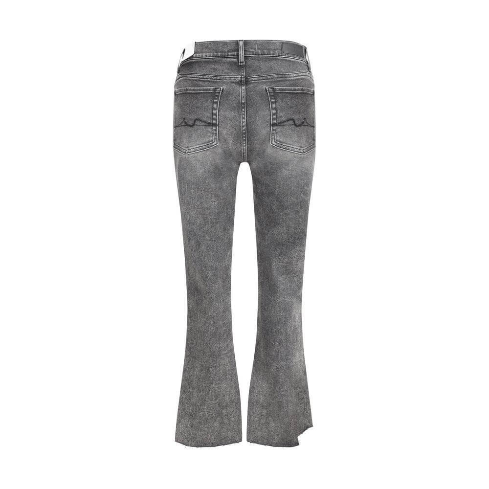 Back view of 7FOR cotton jeans with mid-rise fit, five pockets, and leather logo patch on waistband.