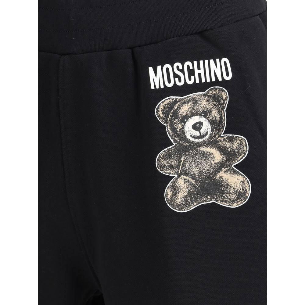 Moschino logo sweatpants shorts featuring iconic teddy bear print and elastic waistband for casual style.