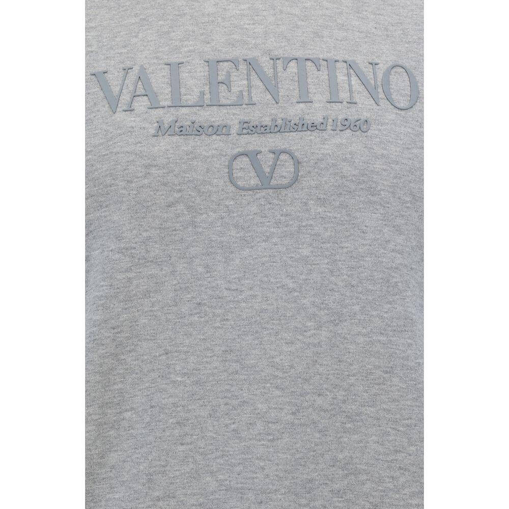 Valentino cotton sweatshirt with ribbed crew neck, cuffs, hem, and contrasting brand monogram on front in monochrome design.
