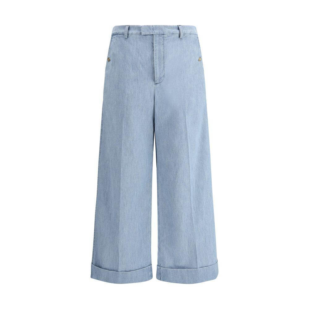 Valentino denim pants with high waist, wide leg, turn-up hems, front zipper, and side pockets for stylish, modern look.