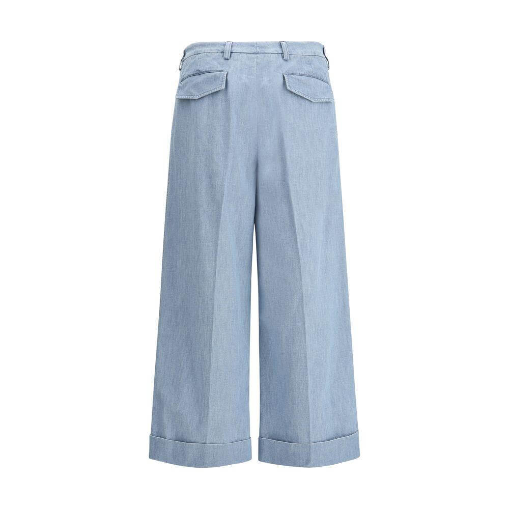 Valentino denim pants with high waist, wide leg, belt loops, back welt pockets with flaps, and turn-up hems for a modern look.