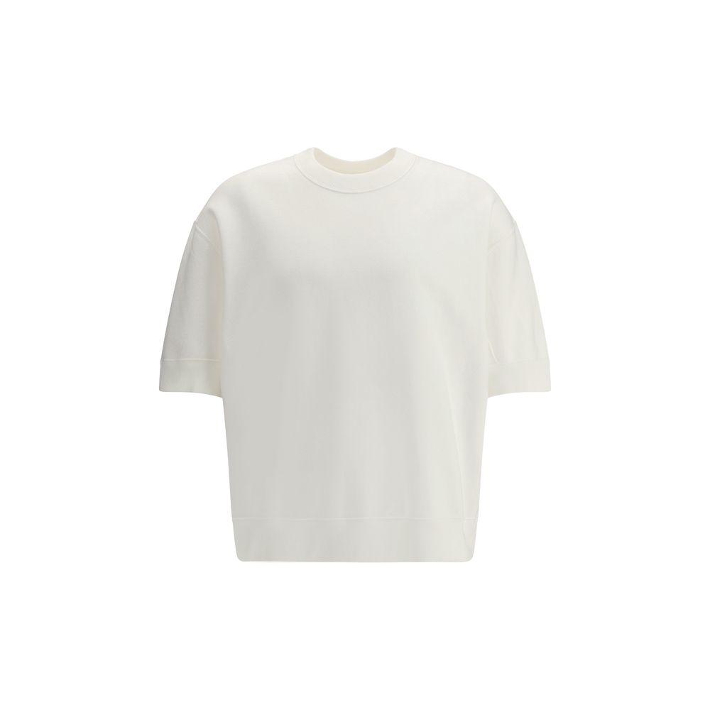 Jil Sander T-Shirt with ribbed crew neck, oversized fit, and monochrome design made from high-quality cotton. Elegant and versatile fashion piece.