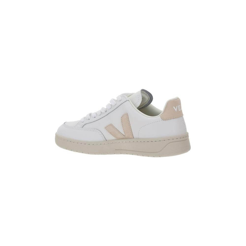 Veja V-12 Sneakers in calfskin with lace-up closure and contrasting logo, featuring a round toe and beige heel counter.