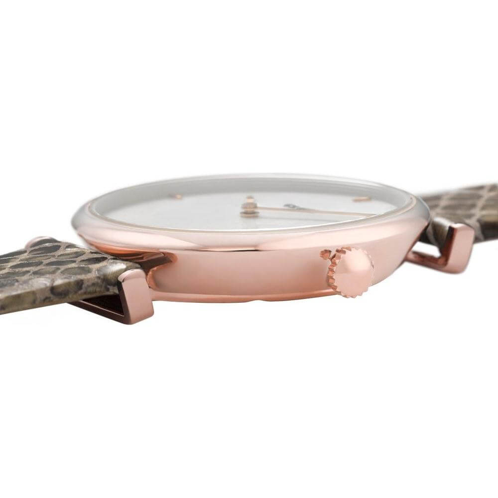 Side view of Cluse beige leather watch with pink stainless steel case and white dial.