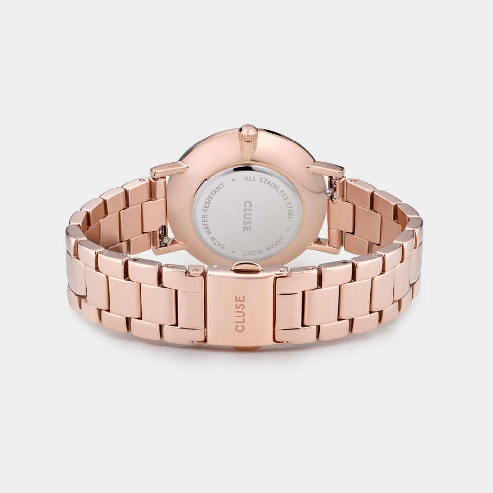 Back view of Cluse Multicolor Pink Stainless Steel Watch with quartz mechanism and pressure closure.