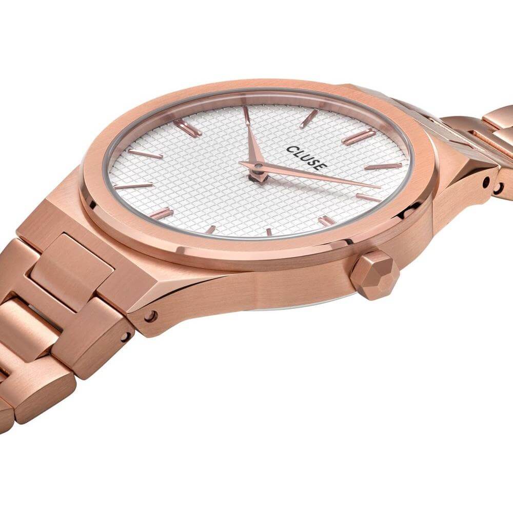 Cluse pink stainless steel watch with white dial, analog display, quartz mechanism, and pressure closure, 33mm diameter, 3 ATM water resistance.
