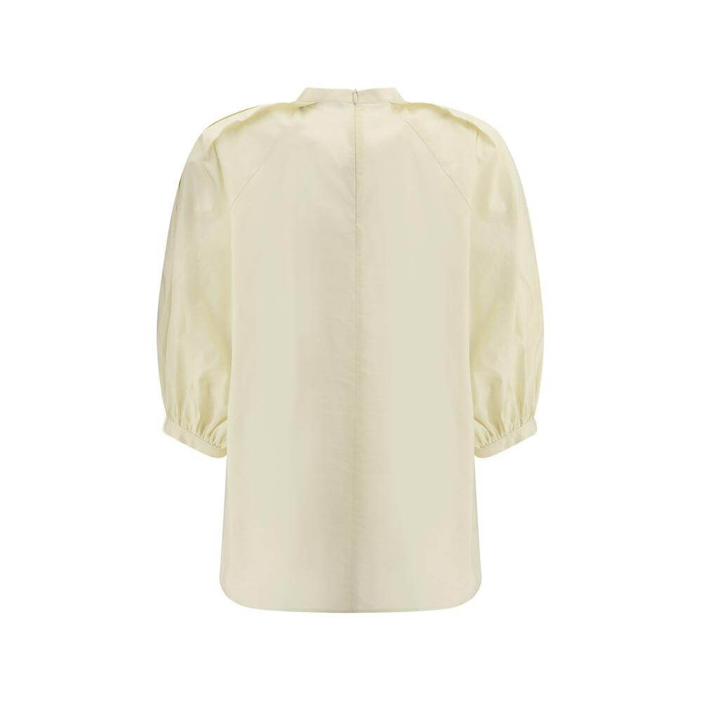 Elegant Fabiana Filippi balloon sleeves blouse made from soft cotton with high neck and back zipper, showcasing sophisticated design.