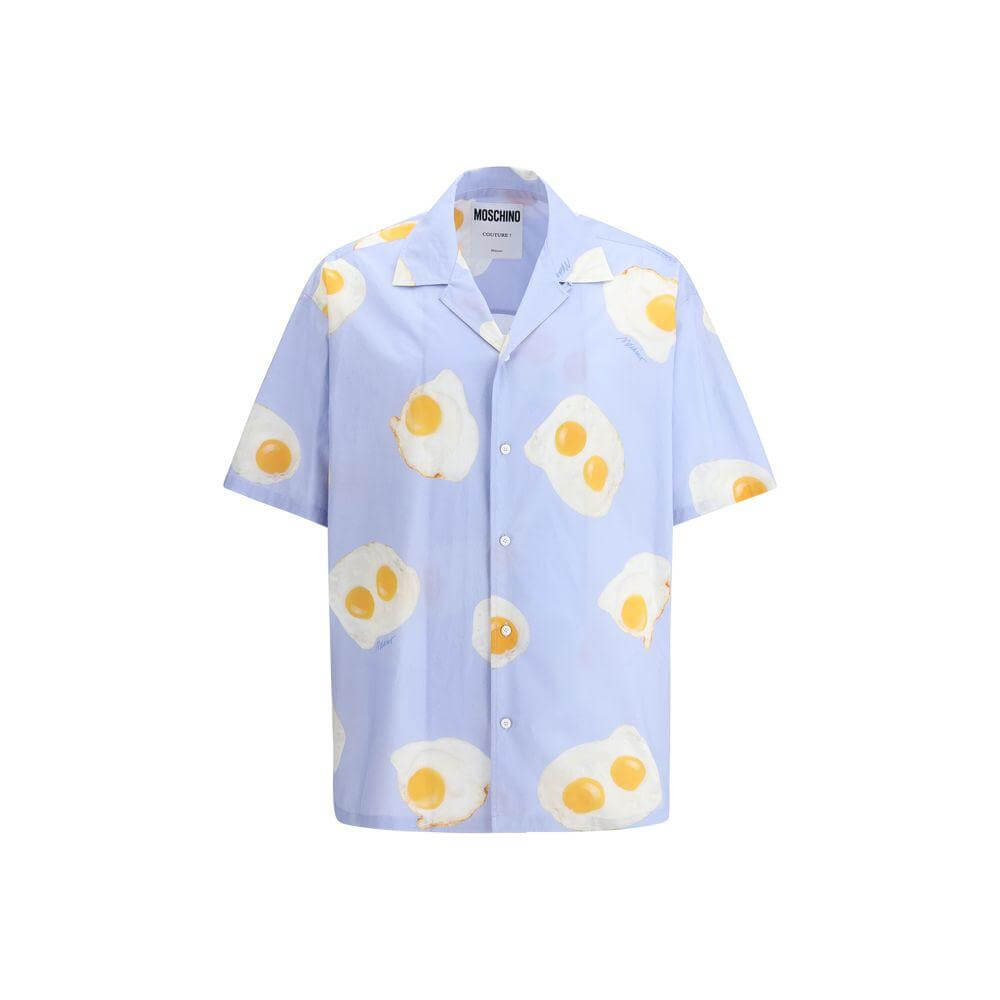 Moschino printed short sleeve shirt with egg graphic, front button closure, and classic lapels for a playful, stylish look.