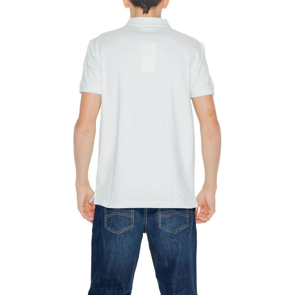 Back view of a short sleeve green polo shirt, Calvin Klein Jeans, made from cotton and elastene, part of spring/summer collection.