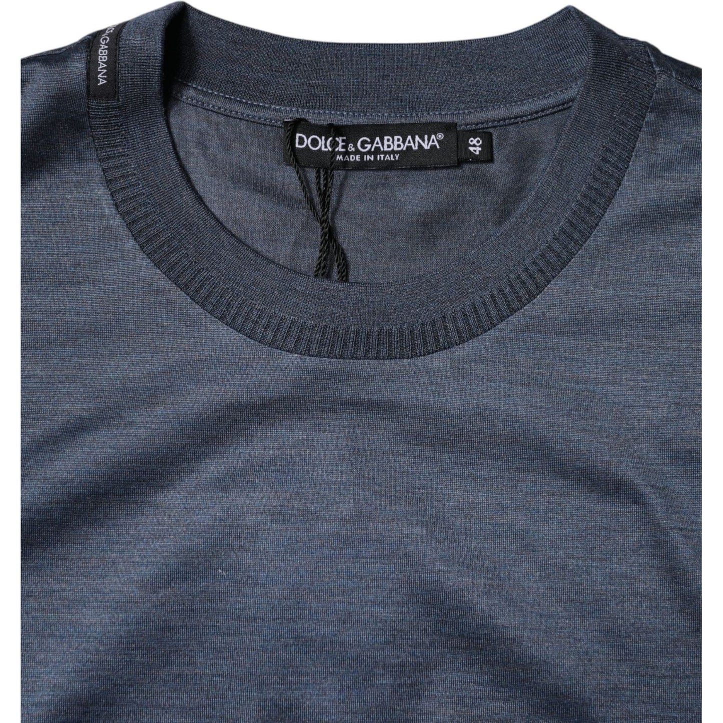 Dolce & Gabbana blue silk crew neck t-shirt with short sleeves, featuring brand logo and made in Italy label.