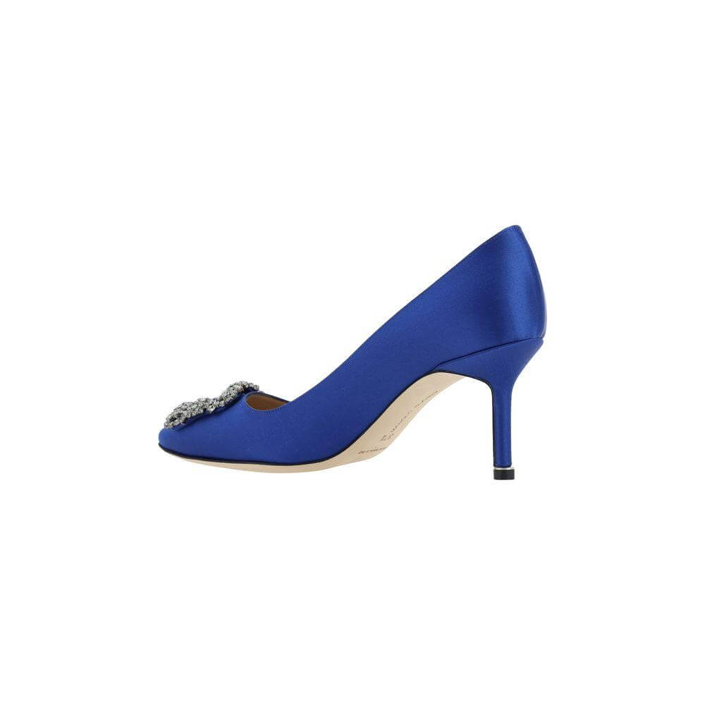 Blue satin Manolo Blahnik Hangisi pump with Swarovski crystal buckle and leather heel.