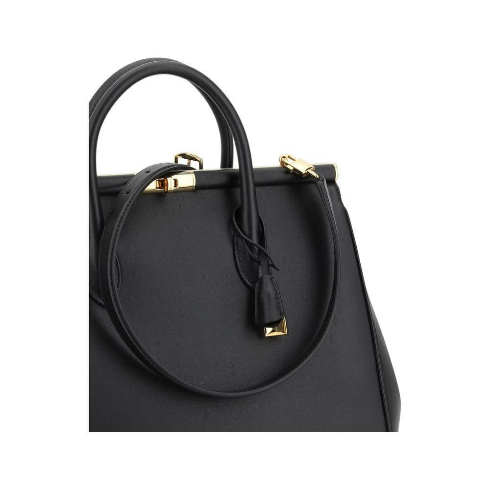 Dolce & Gabbana Marlene Handbag with gold-plated closure and tubular handles, featuring luxury black leather design.