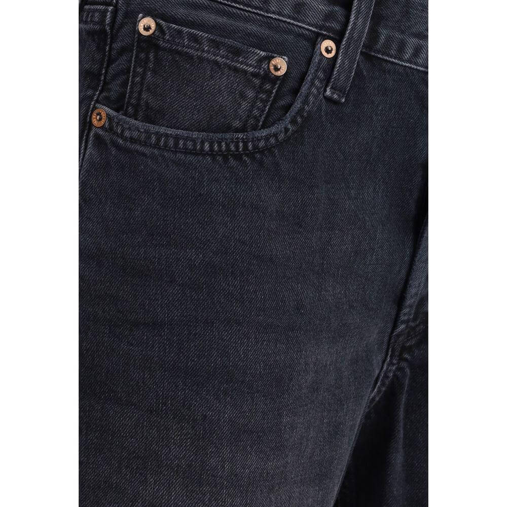 Close-up of Agolde V-waist Shorts in dark wash denim with five pockets and belt loops for a customizable fit.