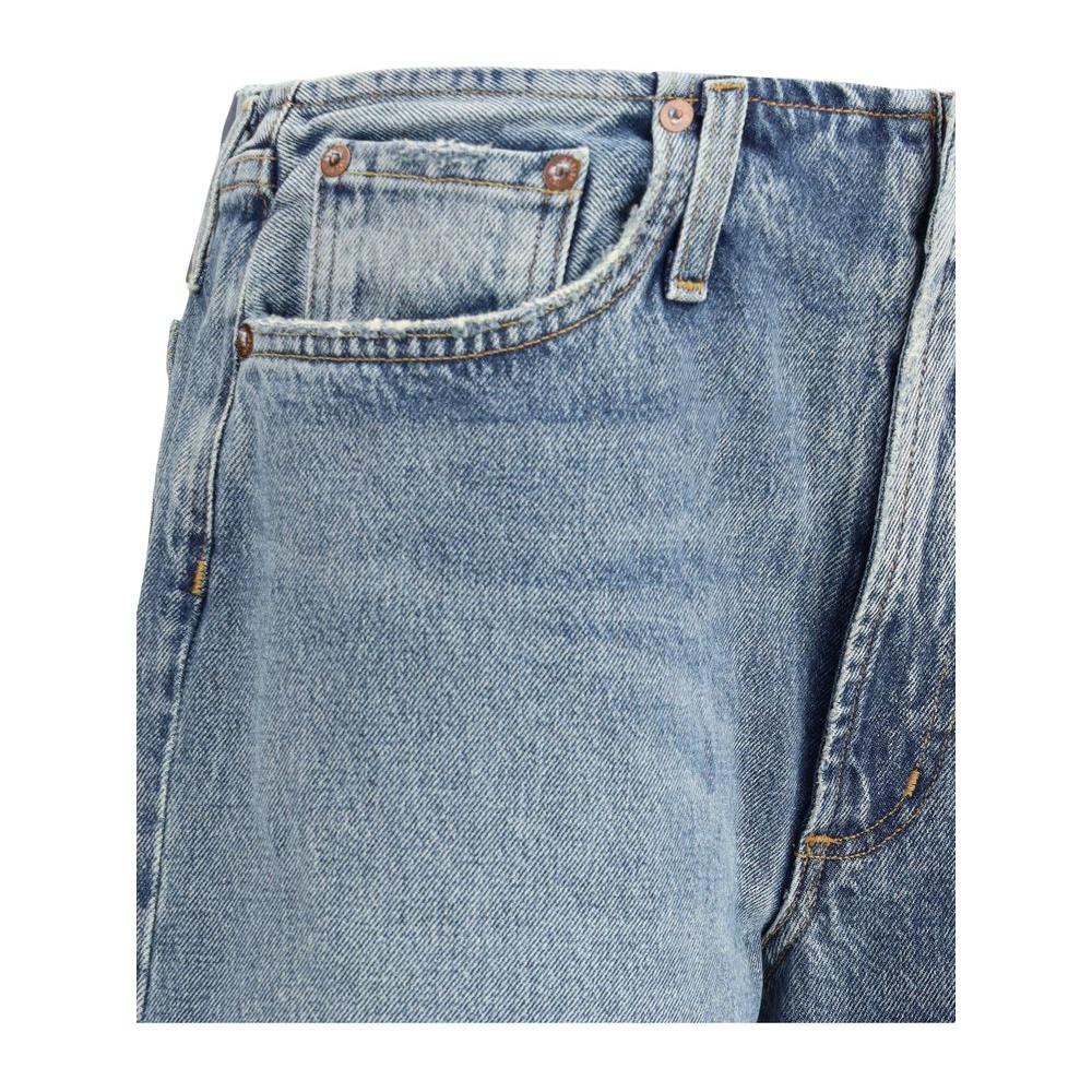 Close-up of Agolde Lex Jeans featuring wide leg design, five-pocket style, and blue denim fabric, showcasing modern and comfortable cut.