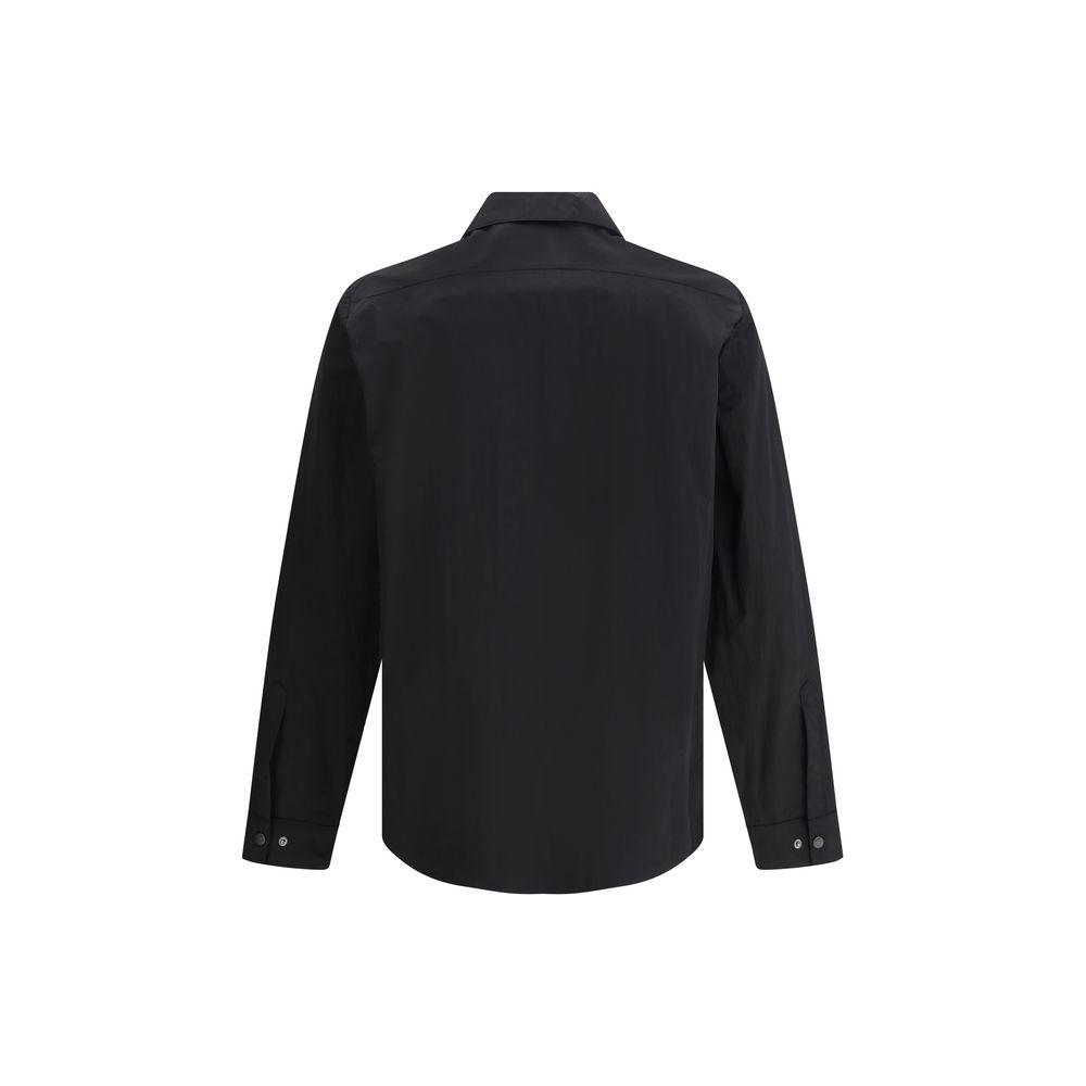 Back view of black Paltò Gilberto shirt jacket with classic collar and adjustable button cuffs, showcasing its refined and versatile style.