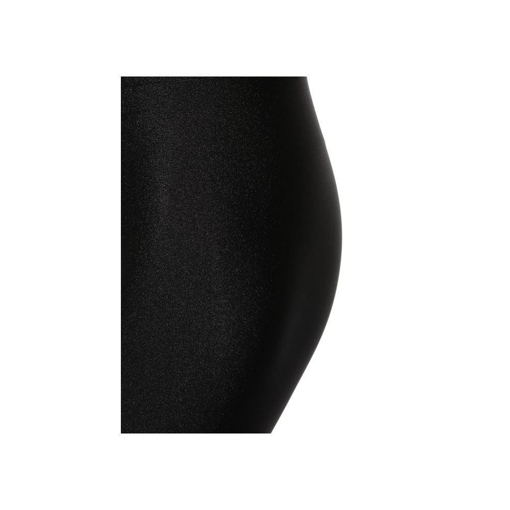 Close-up of Comme Des Fuckdown black polyester leggings, slim fit with logo print. Made in Italy.